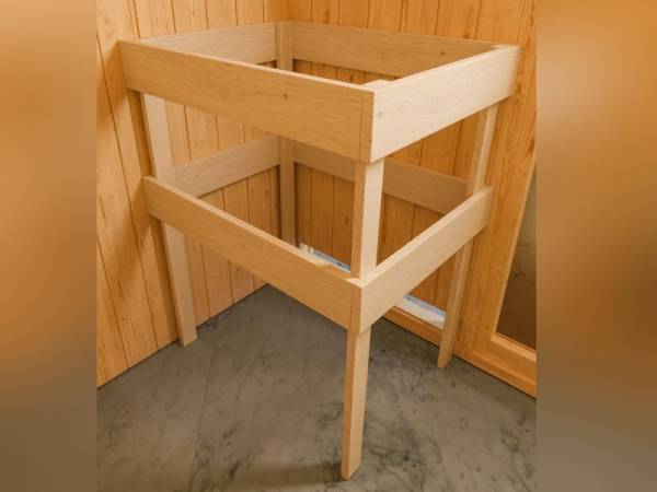 Karibu Woodfeeling Sauna Anja - Klarglas Saunatür - 4,5 kW BIO-Ofen ext. Strg. - mit Dachkranz